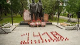 Свечи памяти в Заполярье: в Мурманске провели митинг у памятника воинам Полярной дивизии