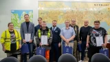 В администрации Мурманска наградили дорожников и горожан, спасших людей на пожаре на Шмидта